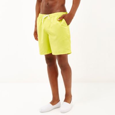 Bright yellow drawstring swim shorts